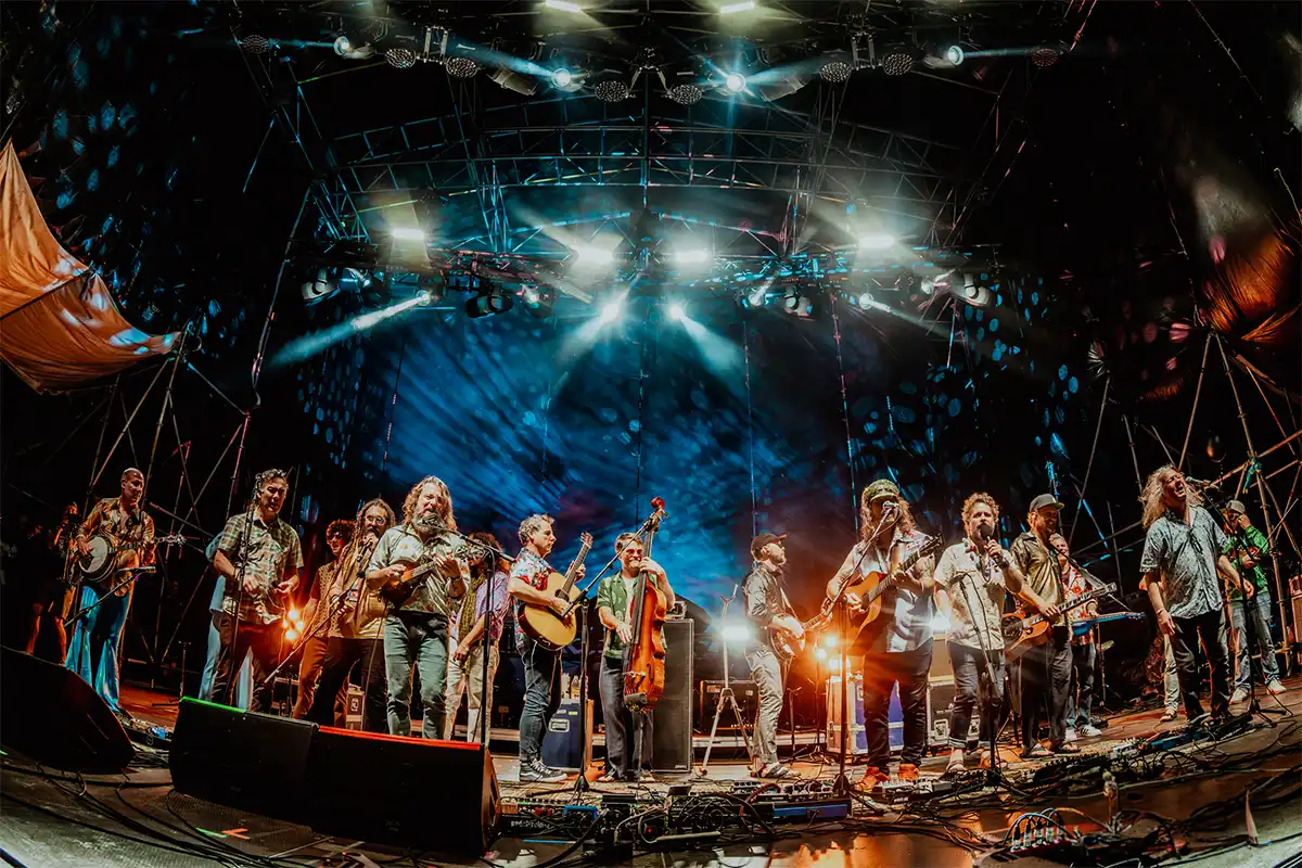 Multiple bands performing together on Beach Stage during collaborative set
