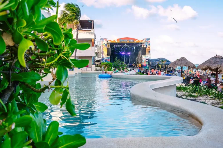 Oceanfront suite swim up pool with Beach Stage in the background.