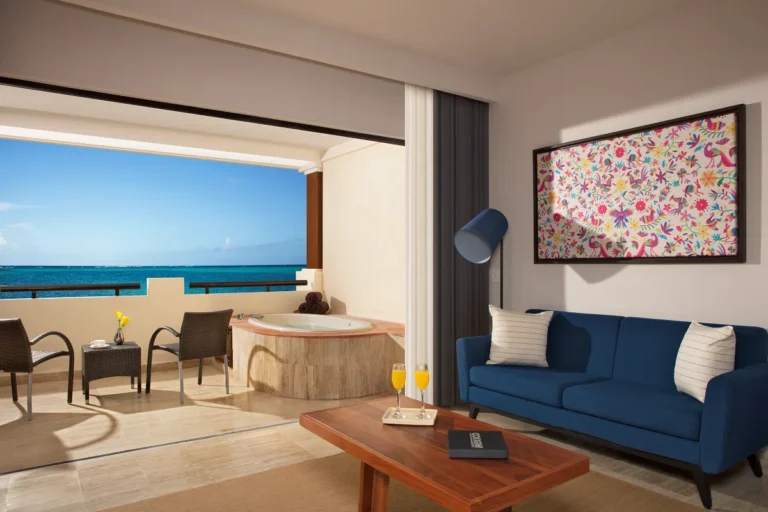 Oceanfront room view featuring the living room area and open balcony.