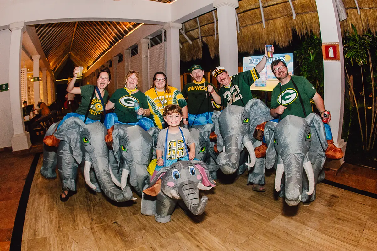 Group of guests in theme night costume.