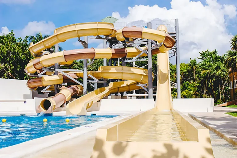 Resort waterpark slides on a sunny day.